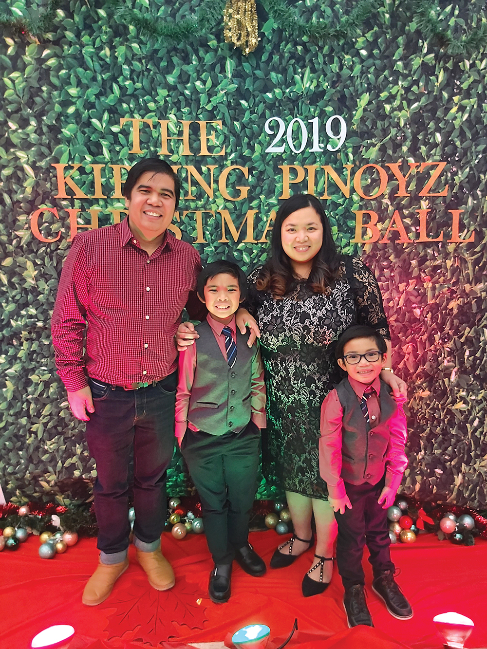 Elainy Cacho with husband Dennis and sons Eiden and Lorenzo.<br />