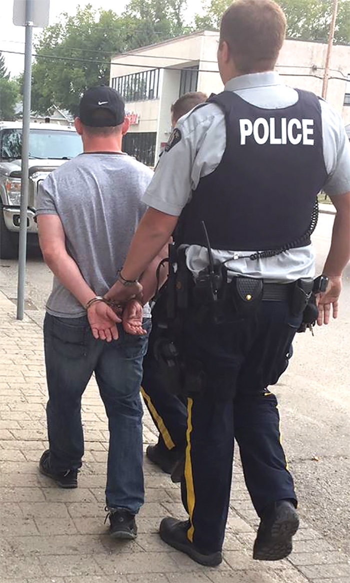 Steven Wuelfrath was arrested by Moosomin RCMP Wednesday, Sept. 13. At right, cash and a computer reported stolen were among many items retrieved by Moosomin RCMP from Wuelfrath’s vehicle.