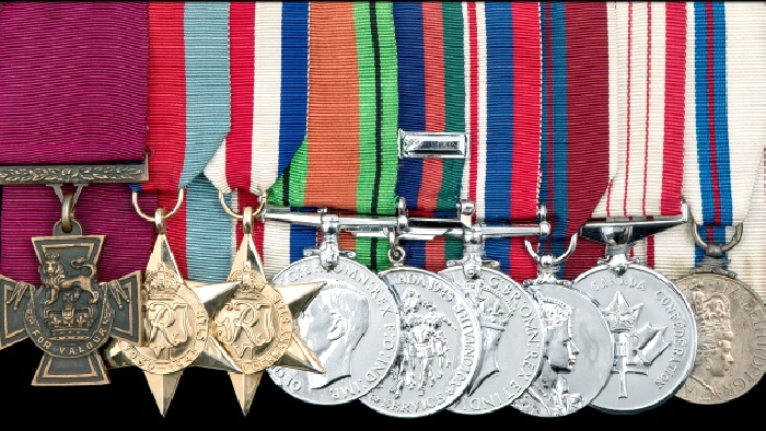 The batch of medals that was sold off in England. The Victoria Cross is at left.