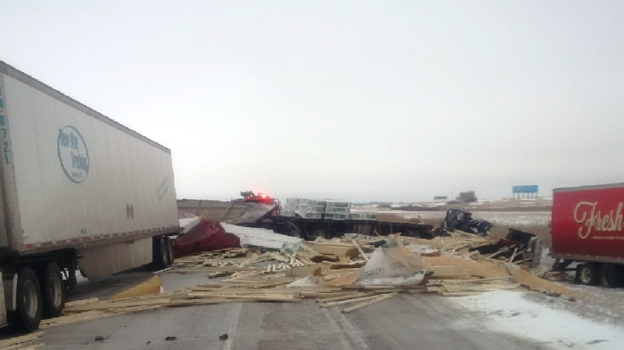 Lumber could be seen spread across the road after the multi-vehicle crash on the Trans-Canada Highway between Brandon and Virden