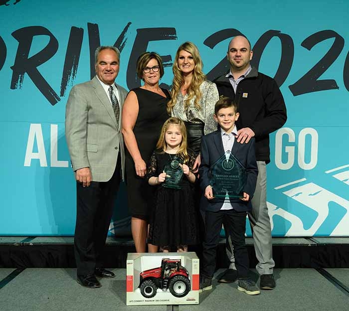 Kristjan Hebert has been named the 2020 winner of Farm Journals annual Top Producer of the Year award. He celebrates with his family in Chicago.  In back, from left, are Louis, Karen, Theresa, and Kristjan Hebert. In front are children Ivy and Bentley