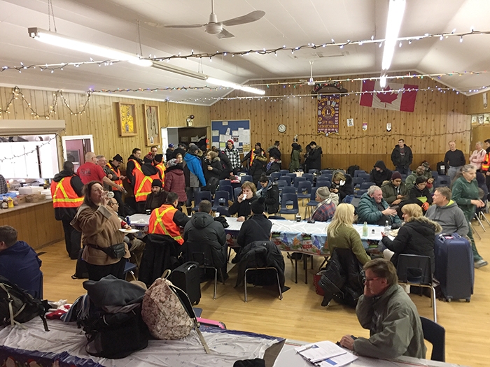 The Spy Hill hall full of stranded Via Rail passengers, volunteer firefighters and volunteers on Christmas Day after a Via Rail train broke down near Spy Hill.