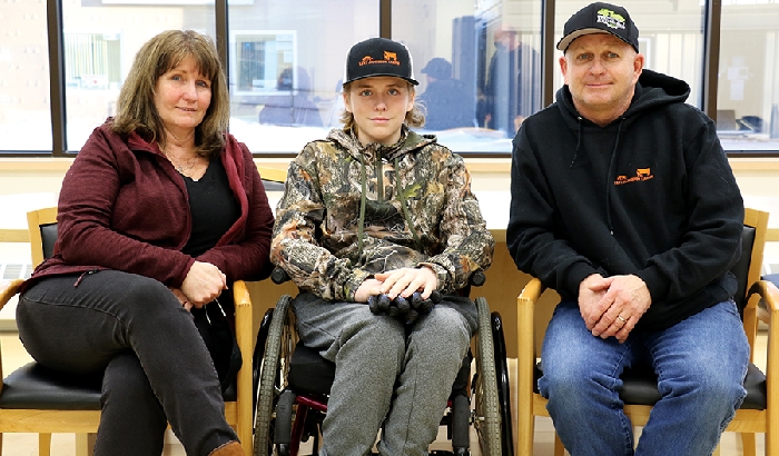 Levi Jamieson with his parents Diane and Darcy.