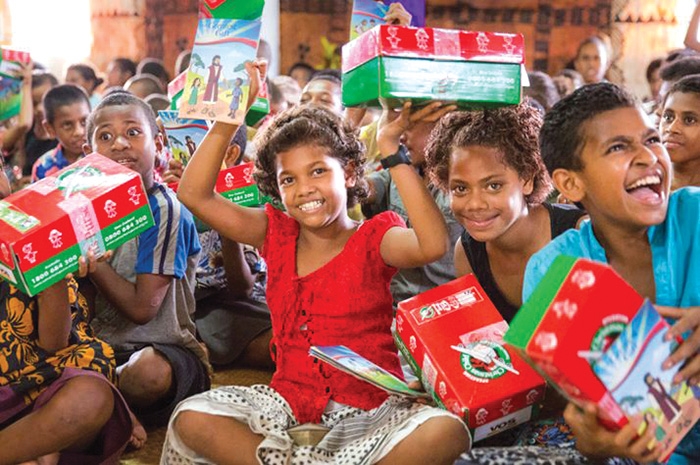 Distribution of Operation Christmas Child shoeboxes is always met with smiles. You can pick up, fill, and drop off shoeboxes this week. Filled shoeboxes can be dropped off at Celebration Ford or at  Moosomin Baptist Church. Organizers are hoping to collect more than their total of 880 shoeboxes that were collected in Moosomin last year.