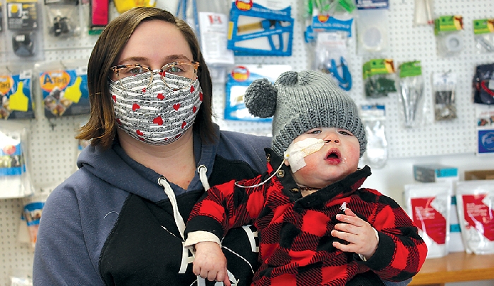 Shown here is Breene and Xavier Kyle at the Virden Animal Hospital after the donation.