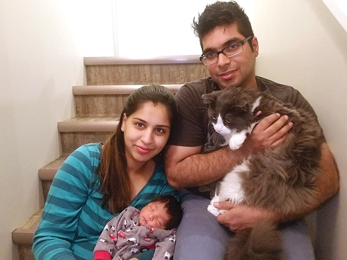 Rayaan Bawa is the first baby born to a Moosomin couple in 2018, at 1:15 in the morning on New Year’s Day. He was born to Mehak and Abhinav Bawa. Above is the couple with their new baby and their cat Romeo.