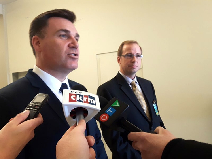 Moosomin MLA and Saskatchewan Minister responsible for Innovation, Steven Bonk, left, and technology innovator Jeff Shirley take questions from reporters