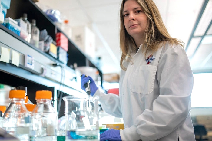 Alyson Kelvin from Dalhousie University is a visiting professor at the University of Saskatchewan lab inside VIDO-InterVac in Saskatoon. (Photo: Liam Richards/The Canadian Press)