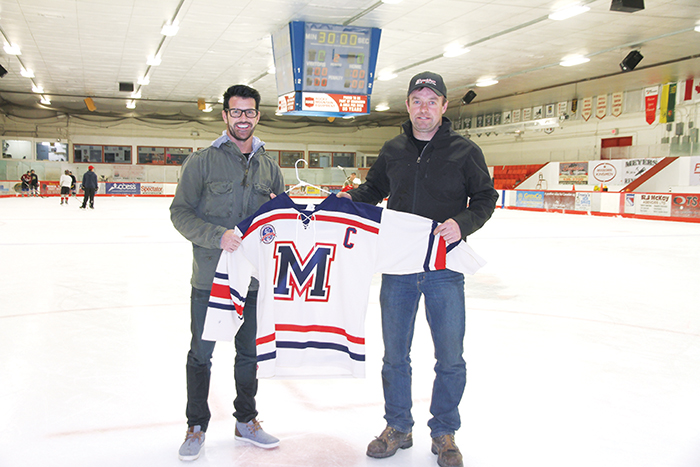 Todd Davidson and Paul Stapleton with the Rangers 40th anniversary retro jersey. Davidson, the owner of Davidson Truck and Tractor, is a Rangers alumni and a long-time sponsor of the team. Davidson helped sponsor the new retro jerseys. Stapleton is the Ranger team captain and has played with the Rangers for 17 years.