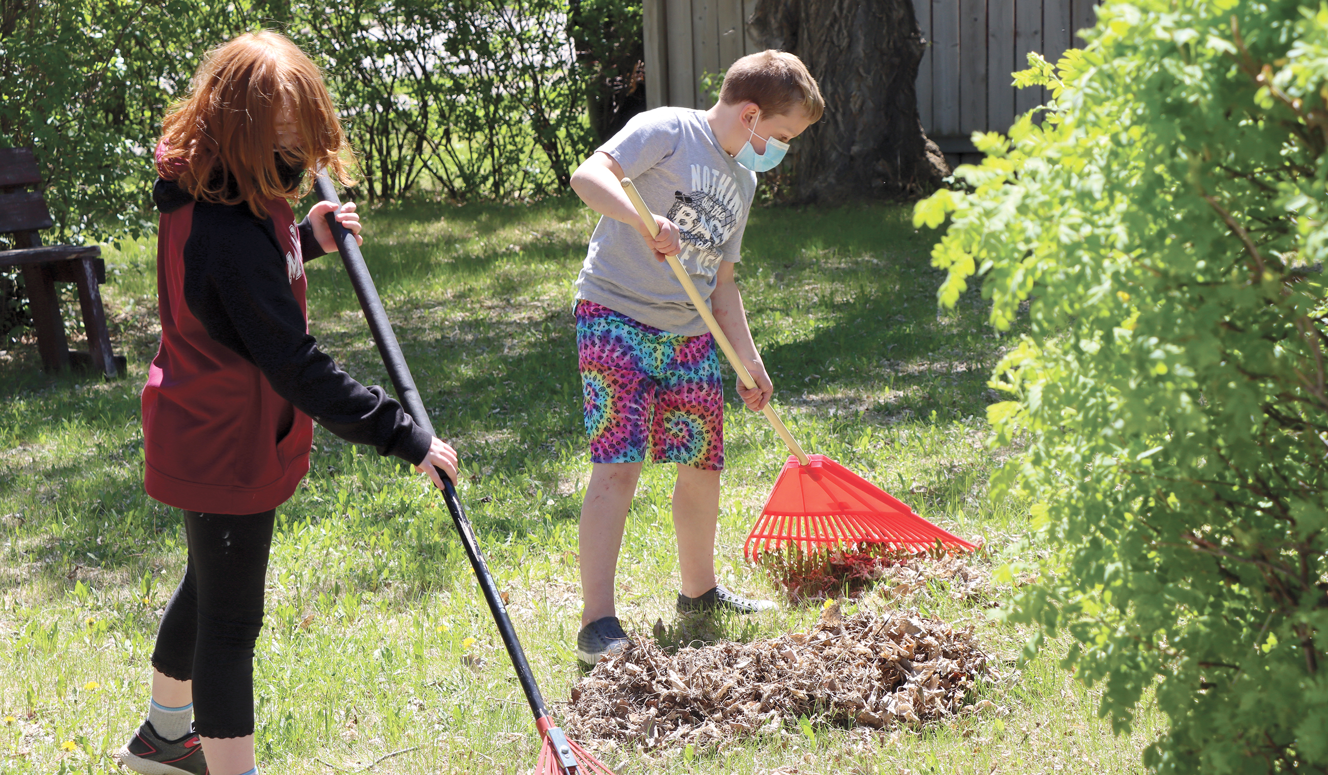 Students made sure to rake up any leaves on the ground while tidying up the park.