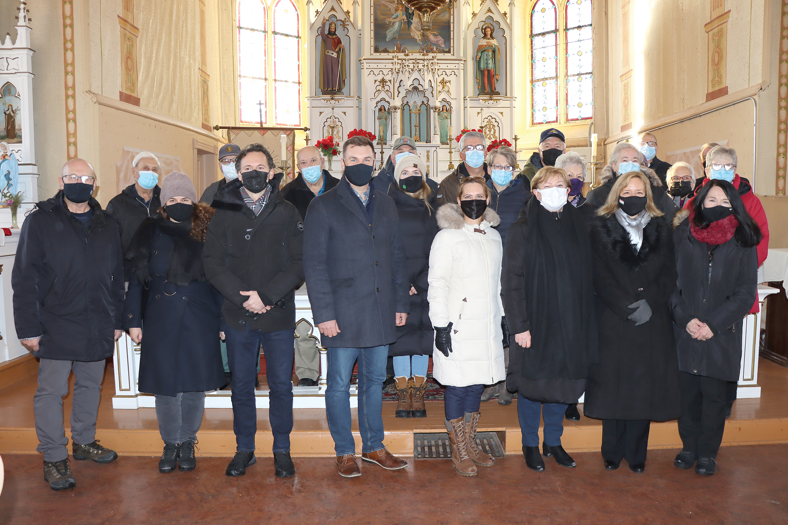 Katalin Szili and Maria Vass-Salazar at Kaposvar church in Kipling along with Candace and Steven Bonk, MP Cathay Wagantall, and members of the Kaposvar Historic Society.