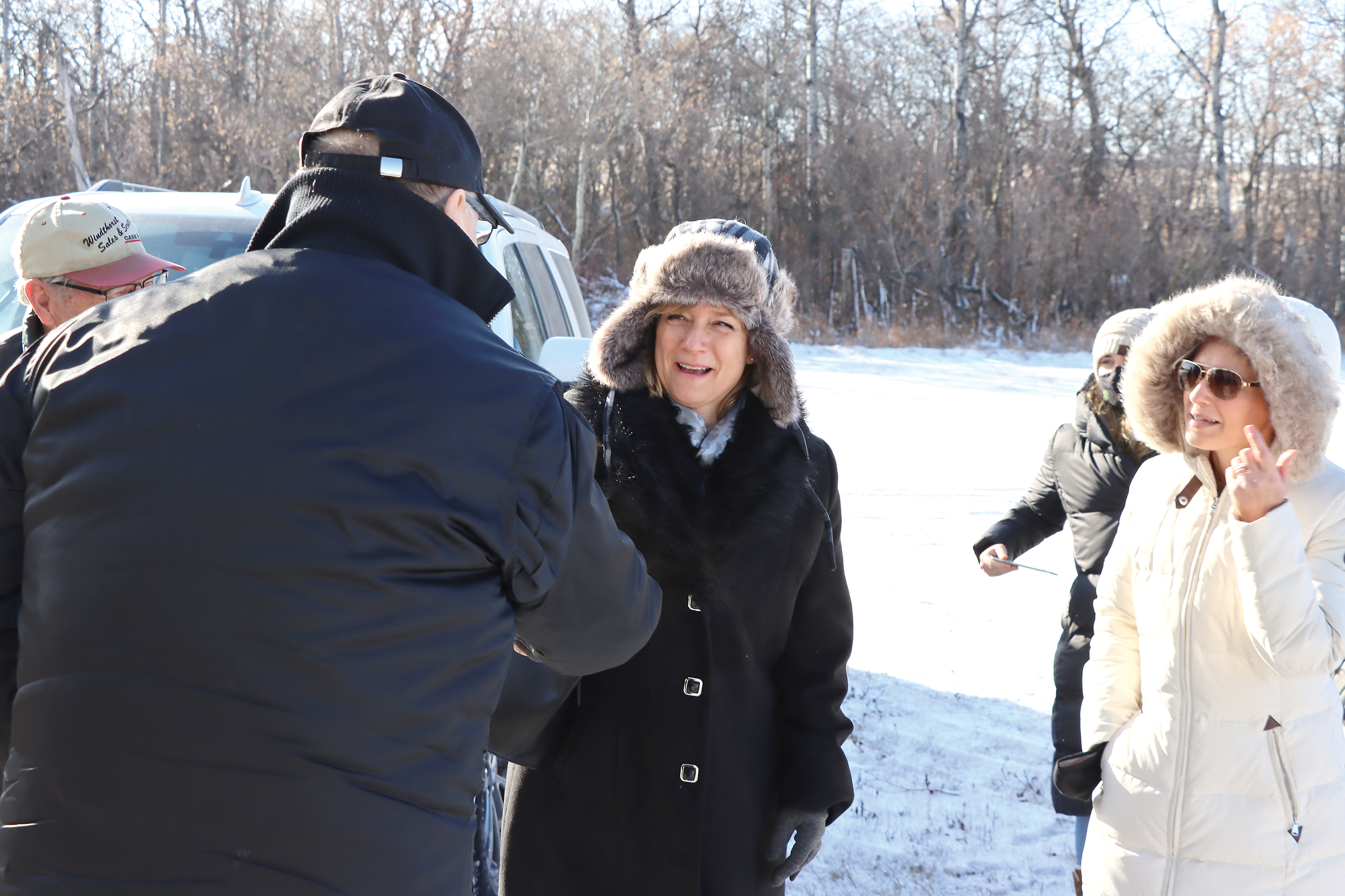 Ambassador to Hungary, Maria Vass-Salazar, greeting people outside Bekevar church at Kipling.