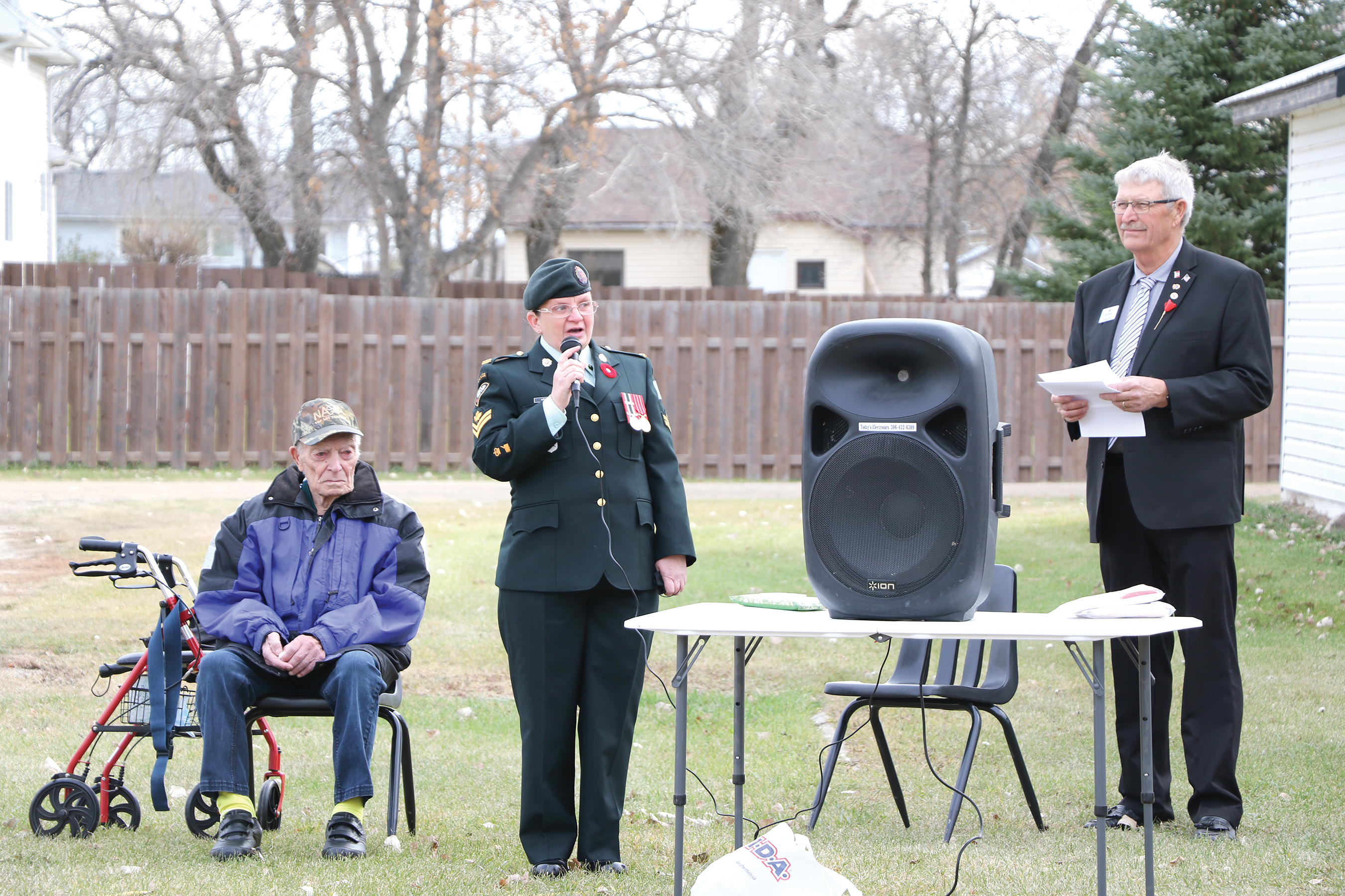 Veteran Jim Clark, Master Corporal Crystal Veysey and Rob Hill of the Maryfield Lions at the ceremony.