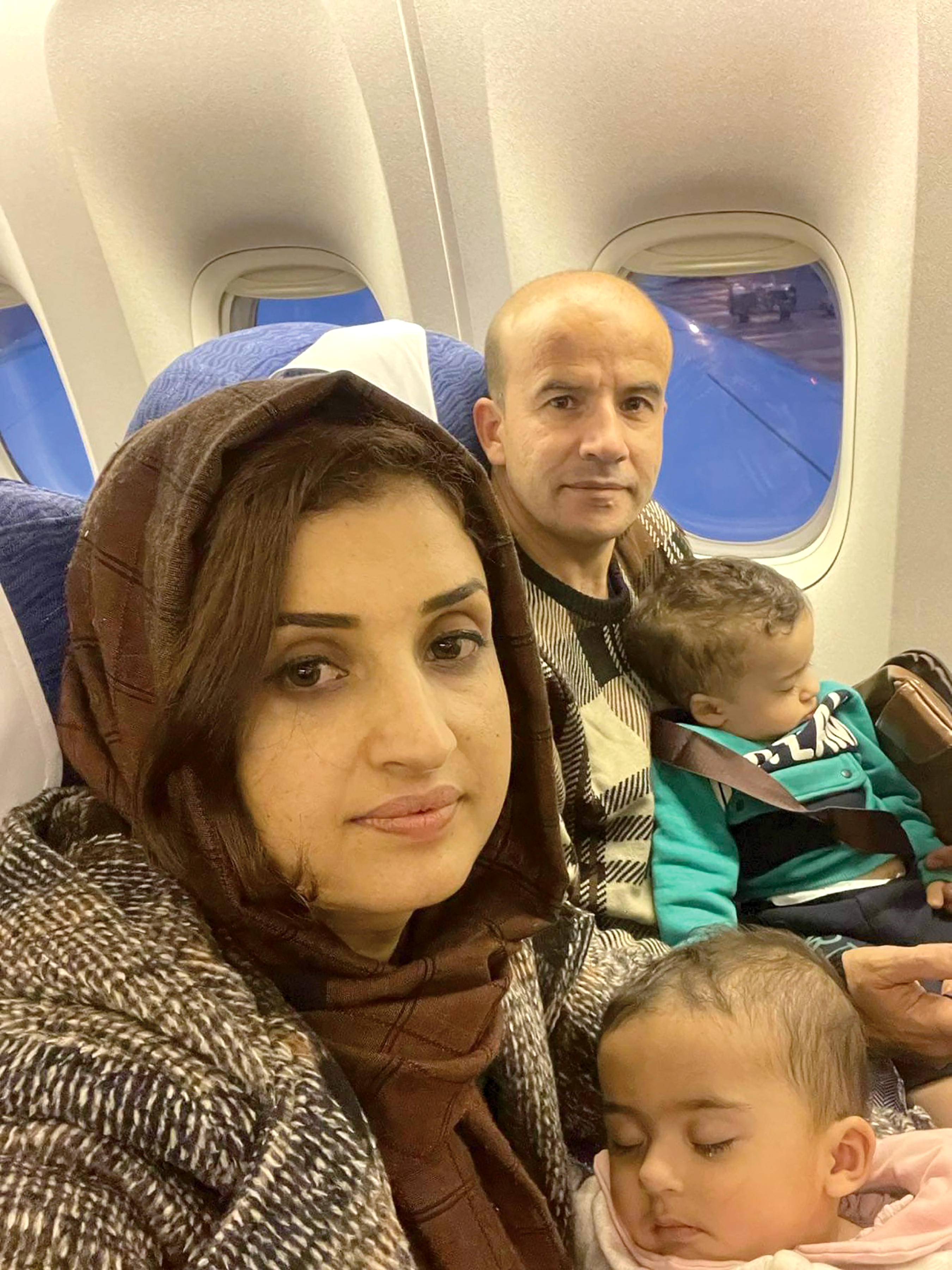 The Sediqi family en route from Islamabad to Vancouver.
