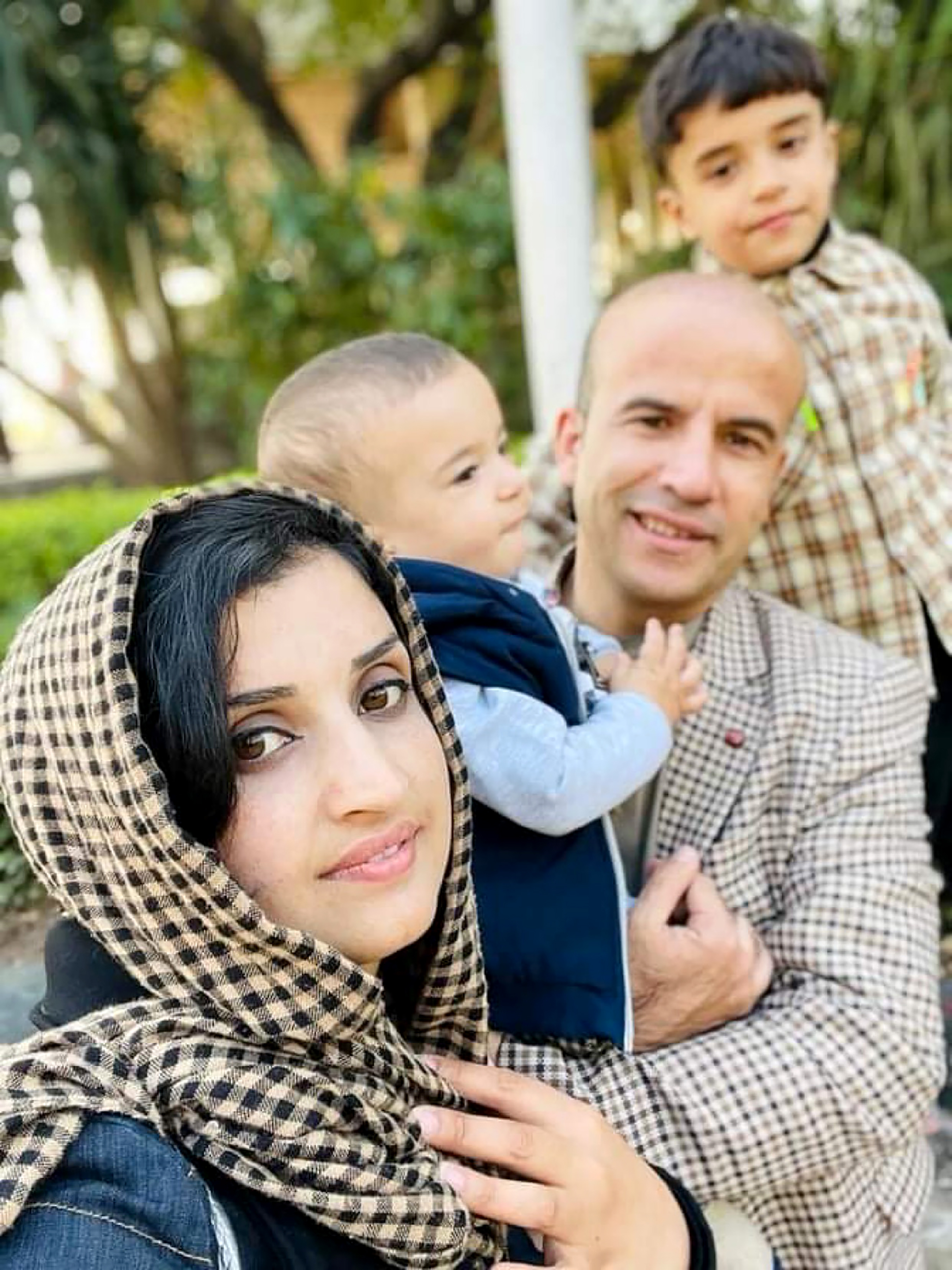 Khowaja Abdul Qasem Sediqi and his family as they were reunited in Islamabad.