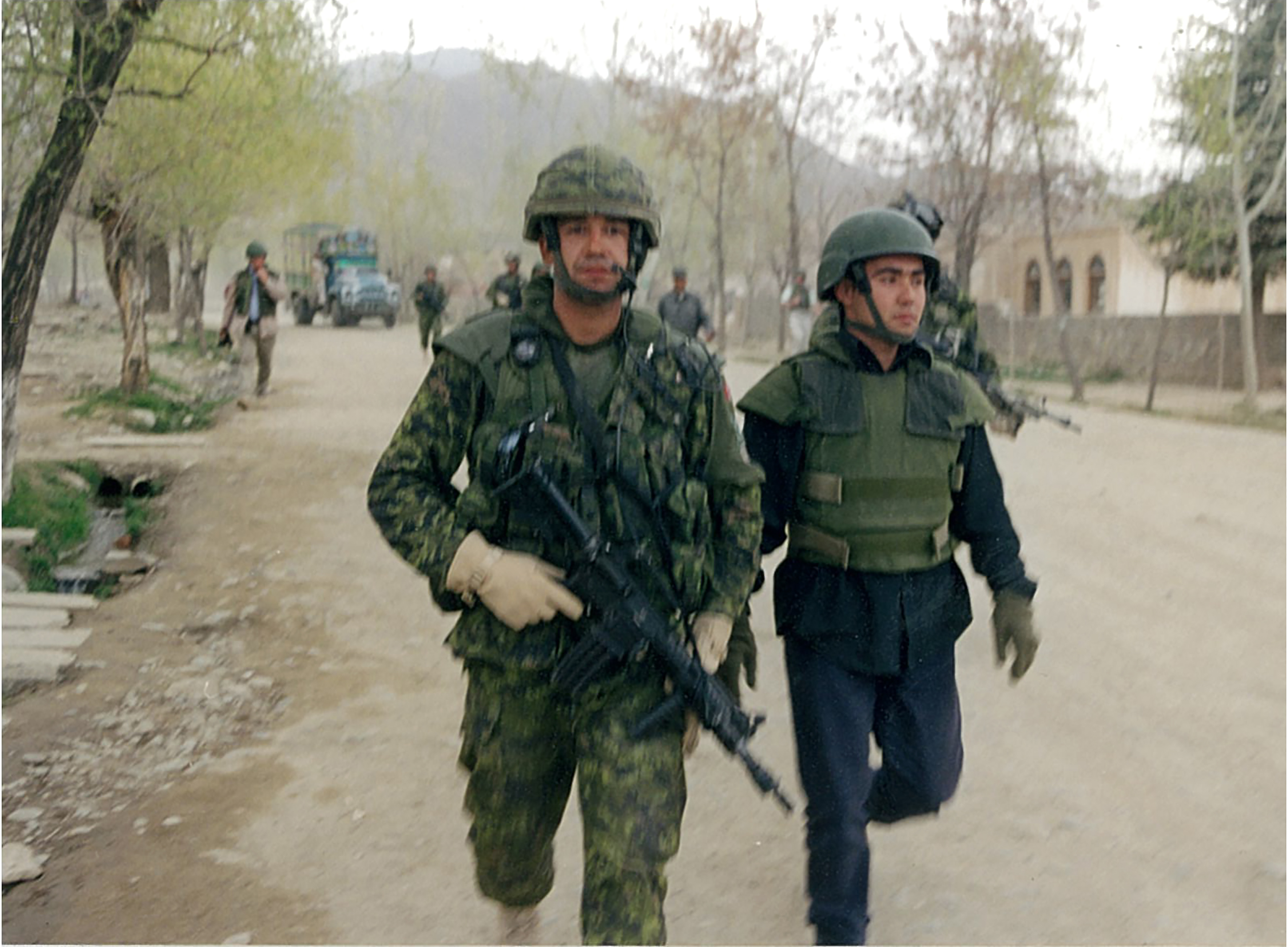 Kevin Weedmark took this photo in Aftghanistan while on a CIDA project. It shows soldiers on patrol in a village outside Kabul.