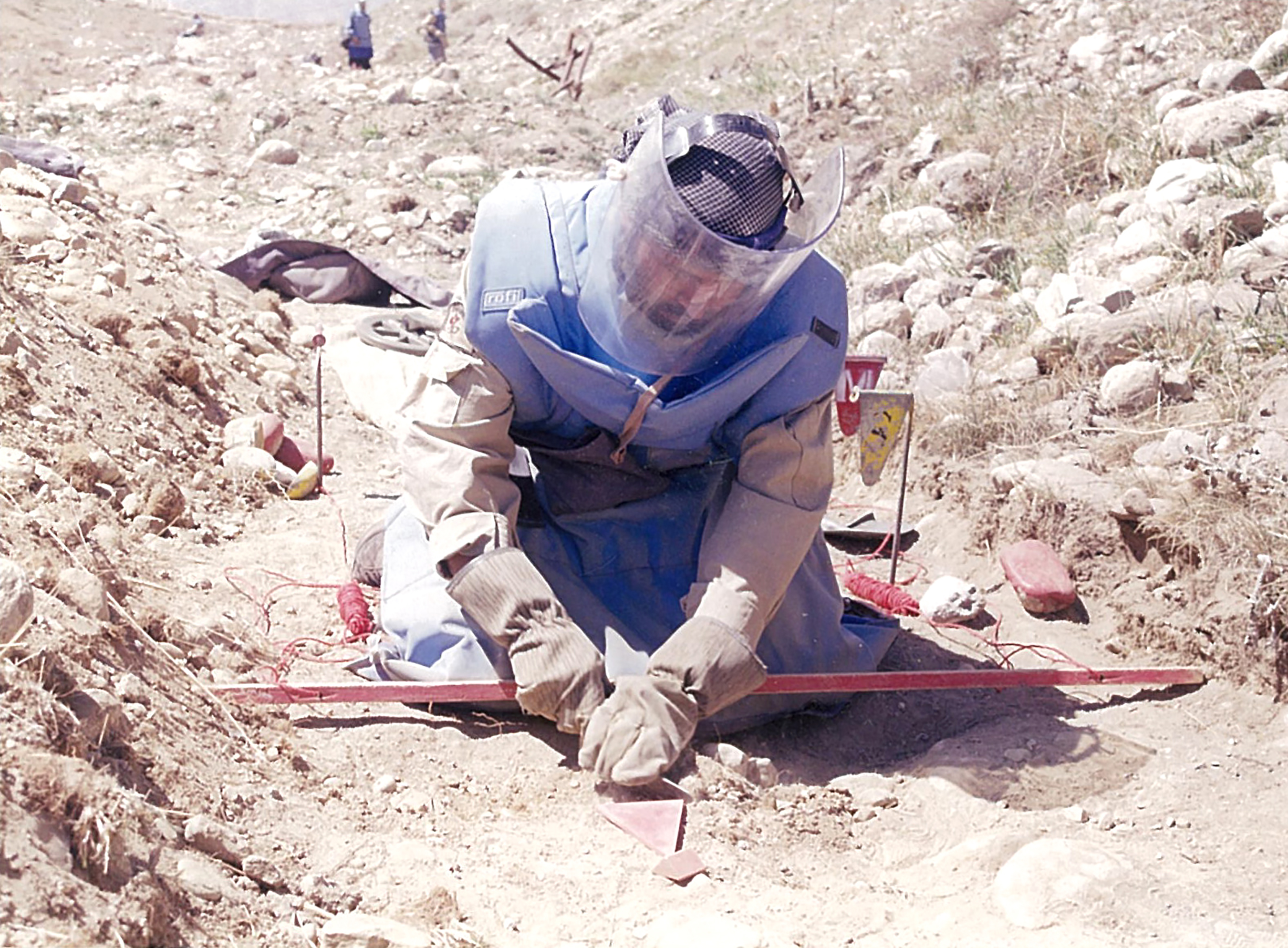 Kevin Weedmark took this photo in Aftghanistan while on a CIDA project. It shows active demining efforts in a minefield in the mountains above Kabul.