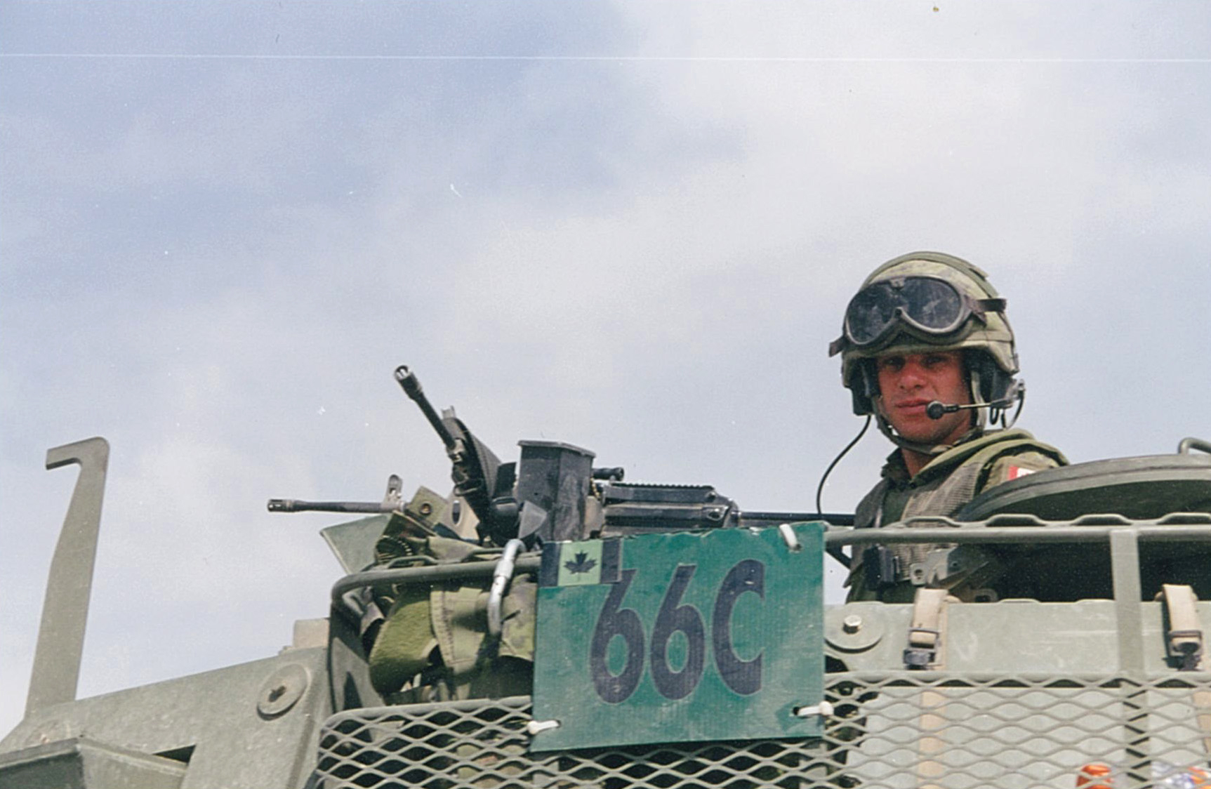 Kevin Weedmark took this photo in Aftghanistan while on a CIDA project. It shows soldiers on patrol in a rural area of Afghtanistan in a Coyote Light Armoured Vehicle.