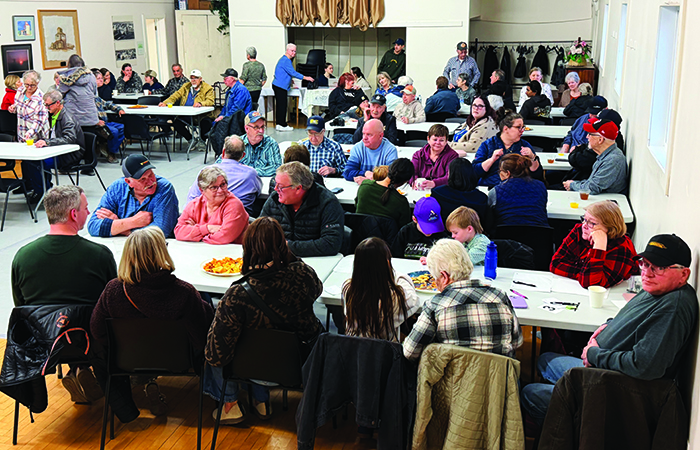 The crowd at the pie auction. Extra tables had to be added this year