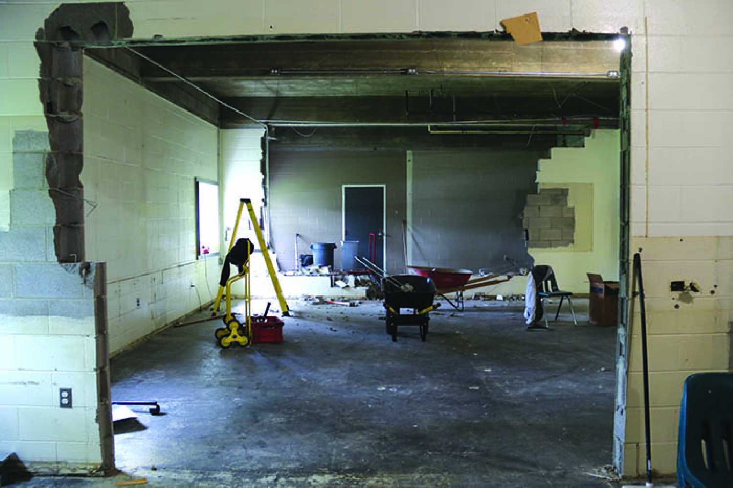 McNaughton High School begins demolition in Home Ec lab.