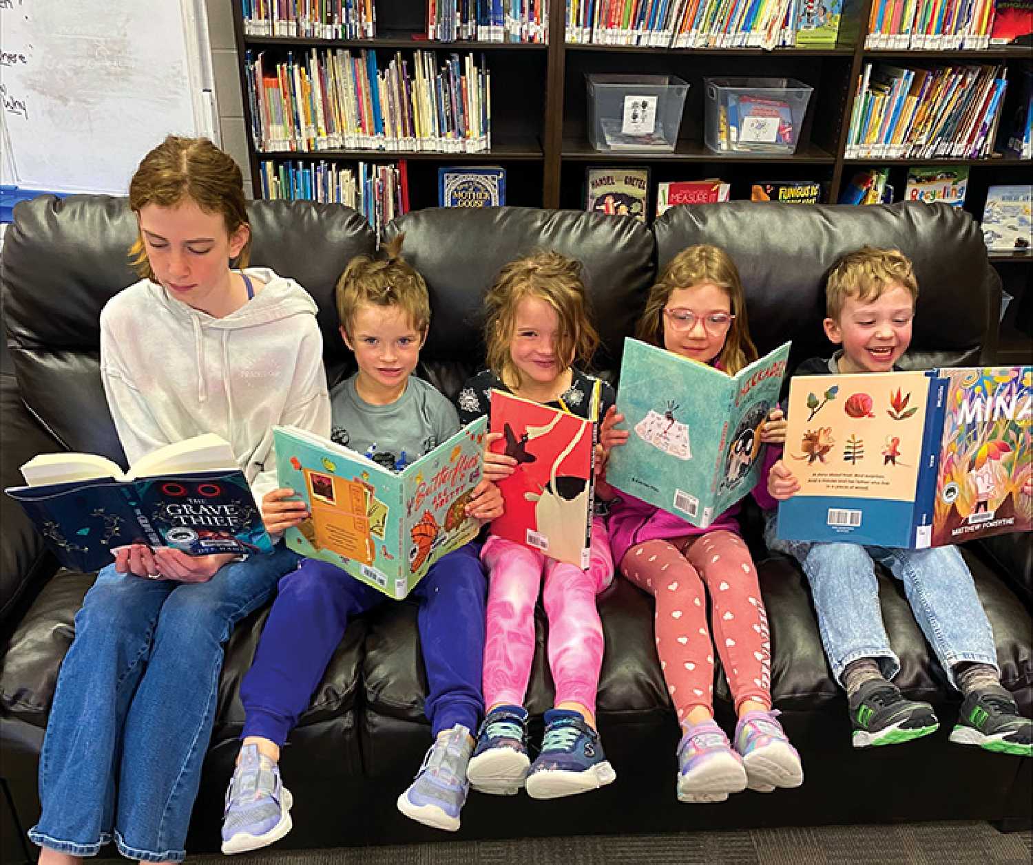 Students reading Canadian authors nominated books