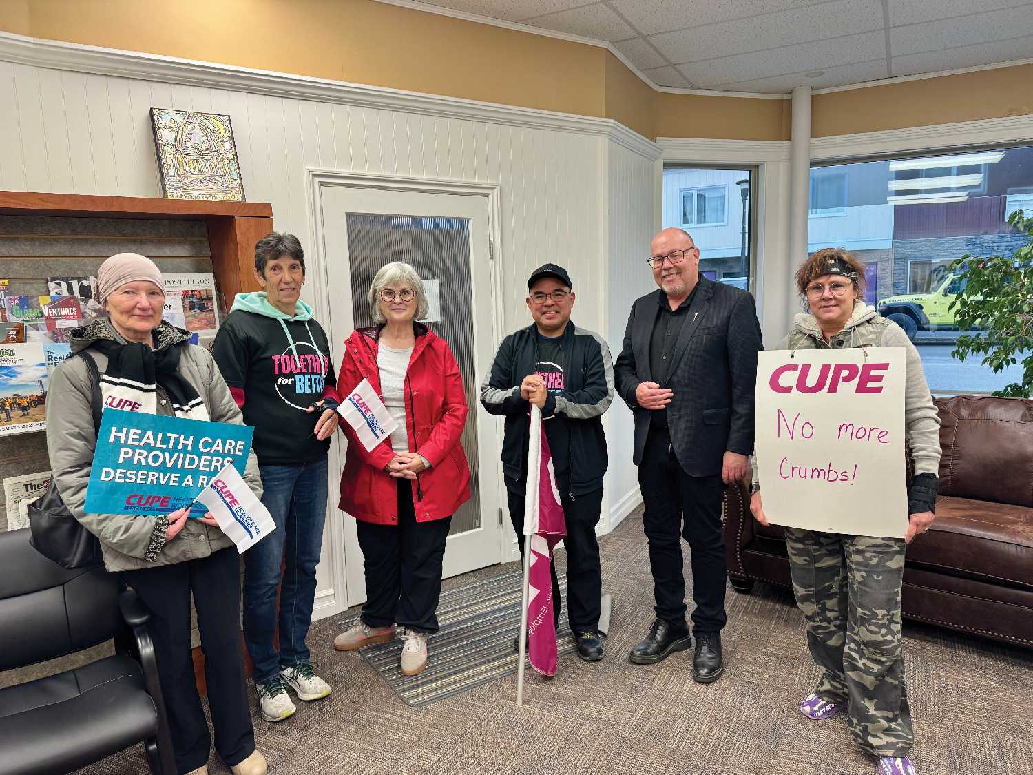 CUPE Local 5430 holding a rally on Main Street Moosomin on Friday and meeting with Moosomin-Montmartre MLA Kevin Weedmark at his office in Moosomin below and below right.
