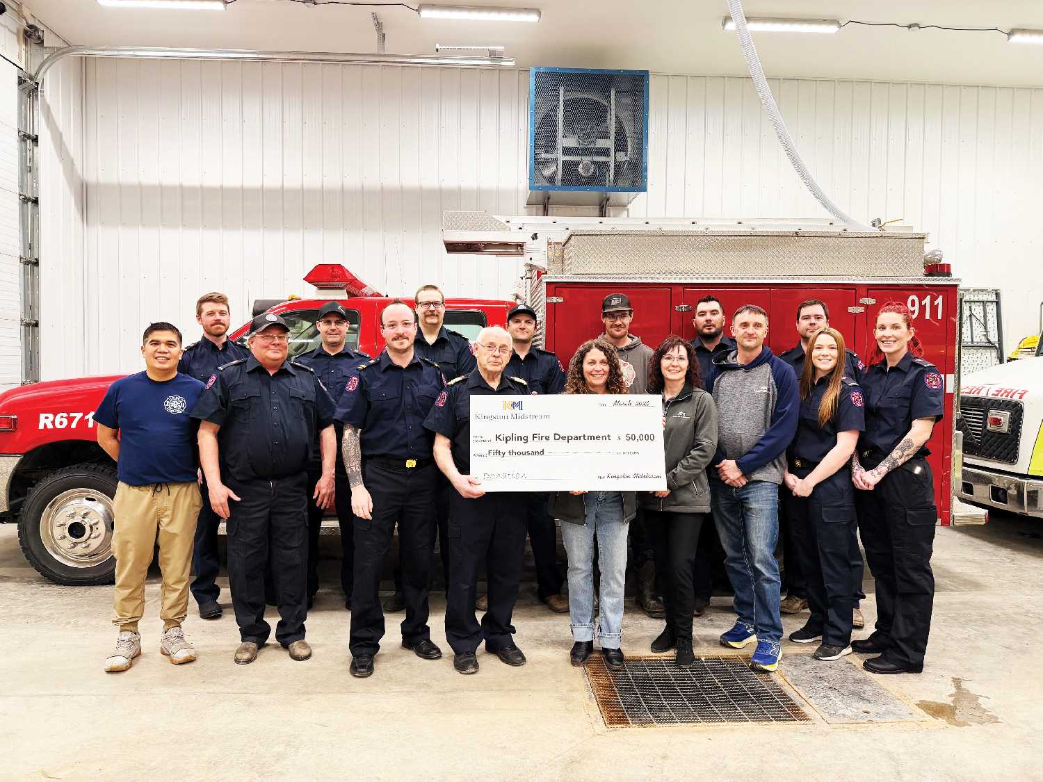 Back row from left: Spencer Davies, Dwayne Dedecker, Dan Lyons, Travis Kish, Brody Heaton, Jared Toth, and Kirk Oliver. In front are Dennis Cacho, Quentin Oliver, Brody Zepick, and Ken Nordal with the fire department, Tammy Davies, Dena Bachorcik, and Travis Van Meer with Kingston Midstream, and Cheyenne Siebert and Makyla Stender with the fire department.