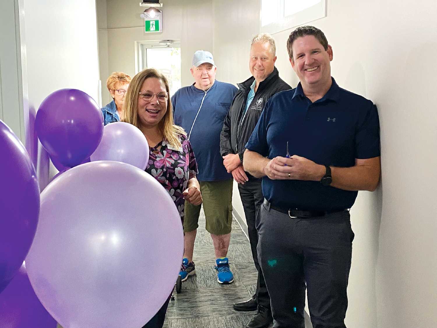 Tracey Alcorn, the owner of Parkland CPAP, and Murray Gray after the ribbon is cut.