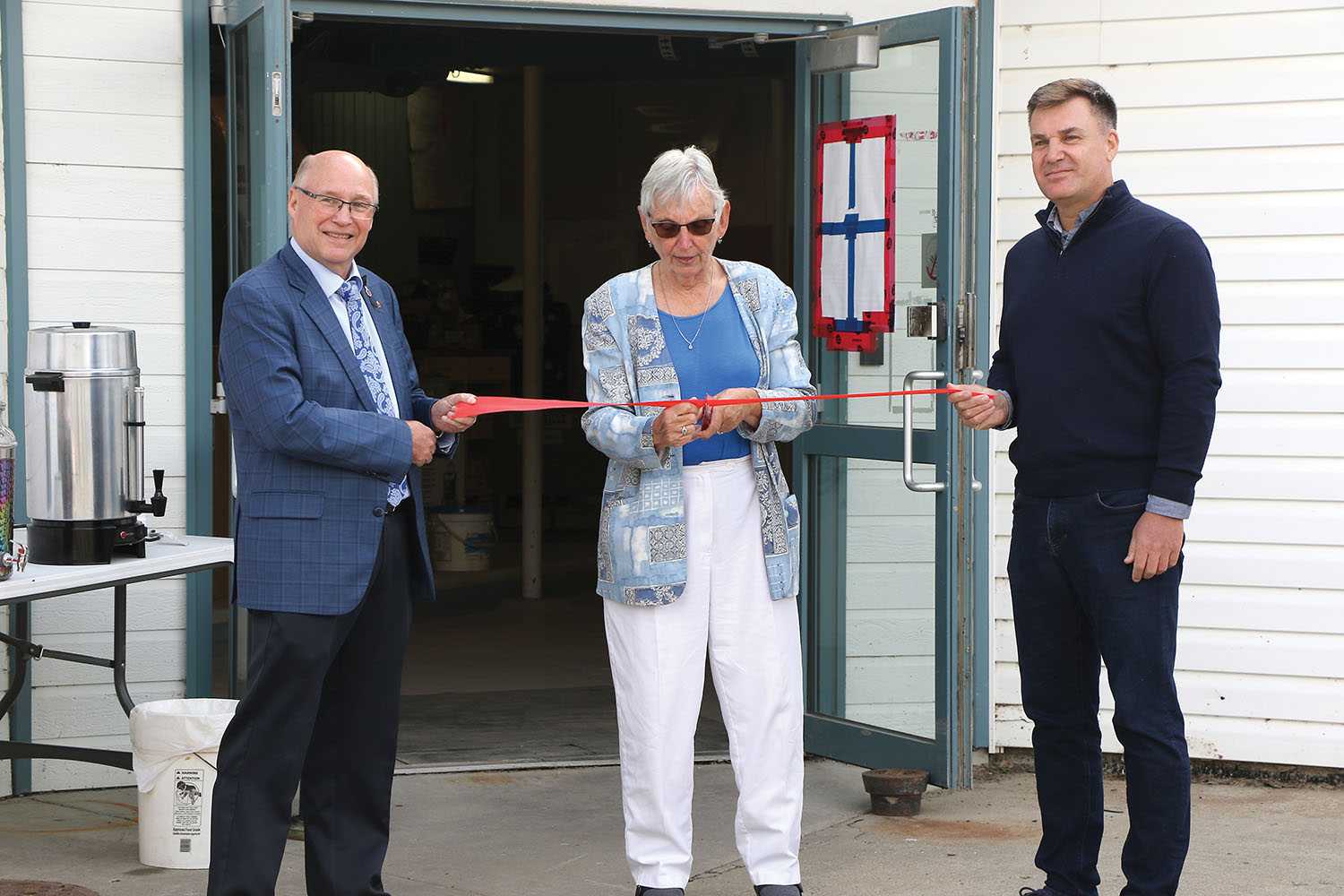 From left are Souris-Moose Mountain MP Dr. Robert Kitchen, Mayor of Kipling Pat Jackson and Moosomin MLA Steven Bonk cutting the ribbon for the town’s water treatment plant. 