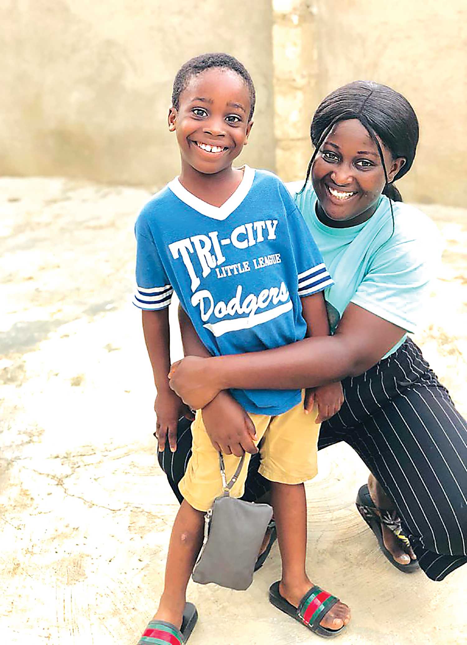 Oliver and his mother, Victoria. Victoria is one of the four kids who started in the Kids in Ghana sponsorship program. Last year she completed her practical nursing diploma and is now working towards enrolling in university.