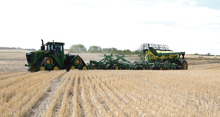 Volunteers were seeding a crop for the Harvest of Hope crop project north of Moosomin recently. The field for the project is six miles north of Moosomin on Highway 8. When the crop is harvested all proceeds will go to the Canadian Foodgrains Bank, which supports development projects around the world.