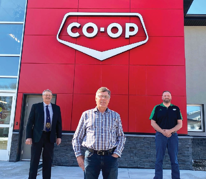 From left, Borderland Co-op president Rob Hill, Hometown Co-op president Lawrence Swanson and Borderland CEO/Hometown GM Jason Schenn at Borderlands office in Moosomin.