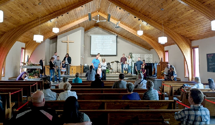 A service at the Moosomin Baptist Church during Covid-19 (photo taken in the fall before the indoor masking mandate).