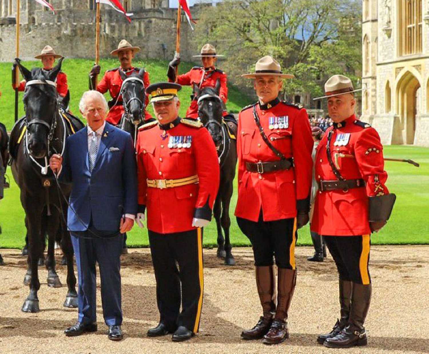 <b>Proud moment </b> Sergeant-Major Scott Williamson, at right, Riding Master for the RCMP Musical Ride, was part of the delegation that presented Noble, an RCMP-trained mare raised in Saskatchewan, to King Charles. Turn to page 21 for more on Williamson and the Coronation.