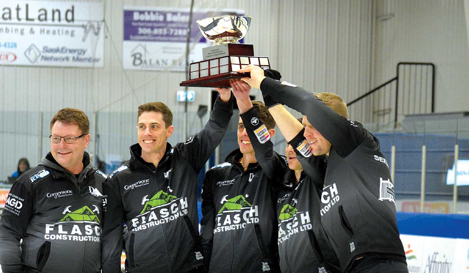 Team Flasch holding the Tankard trophy after their win in Whitewood on Feb. 13, 2022.